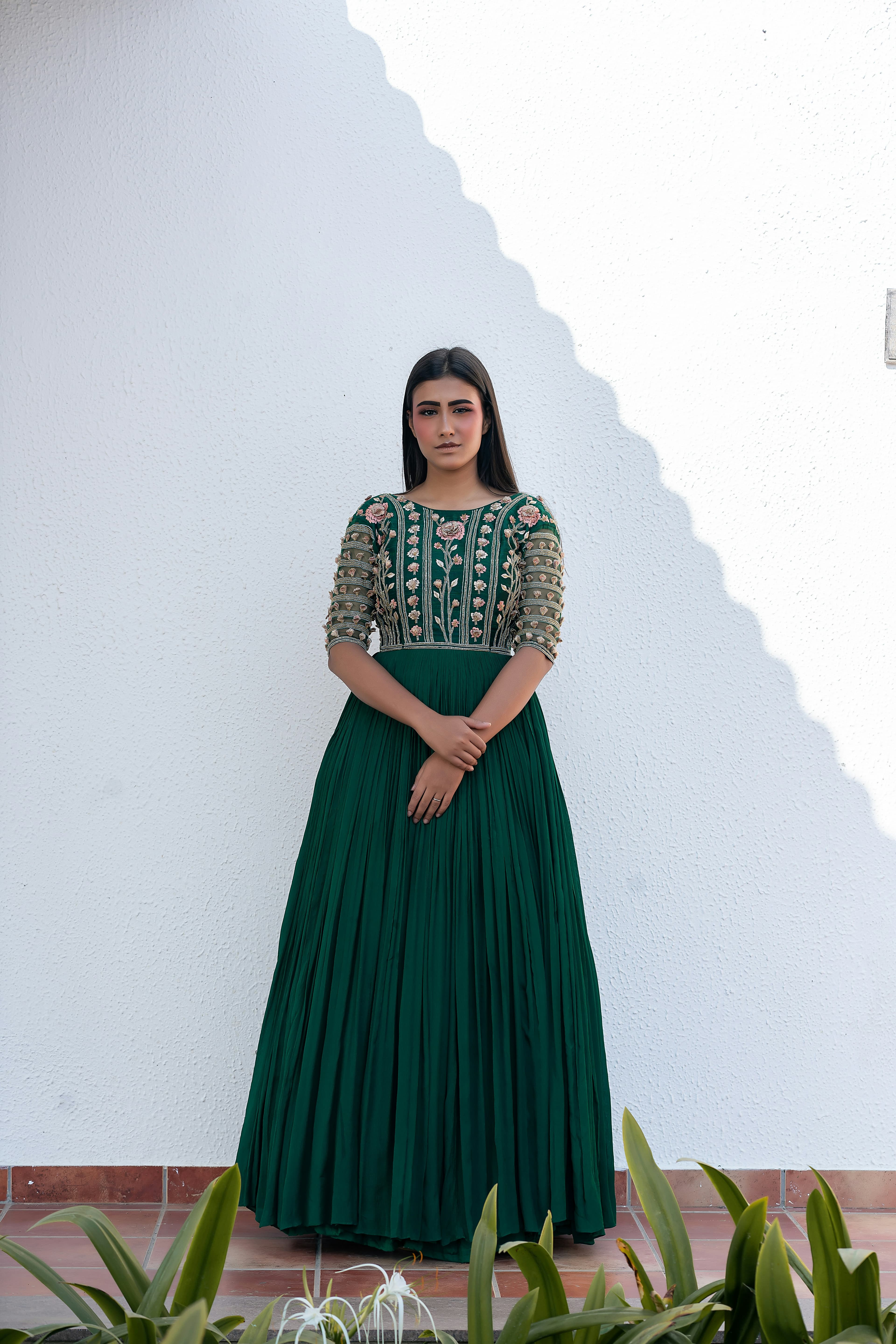 Woman in a pleated dhoti-style jumpsuit